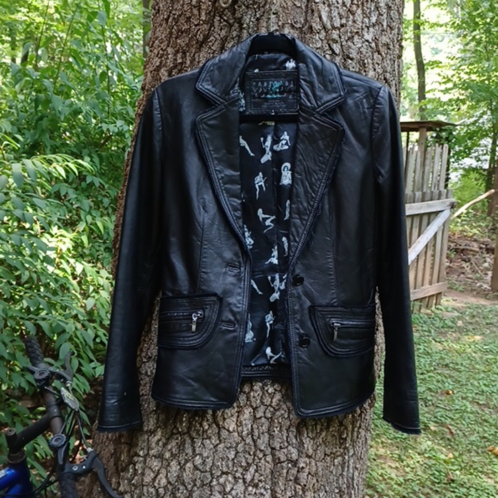 Miss Top Gun leather jacket.